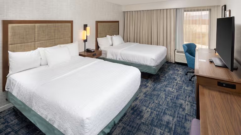 Two-queen guest room at Hampton Inn & Suites — Asheville Airport