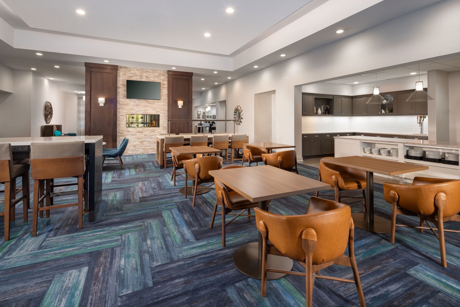 Dining area and fireplace at Homewood Suites by Hilton Asheville